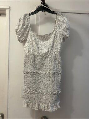 White Floral Smocked Mini Dress from “forever 21”